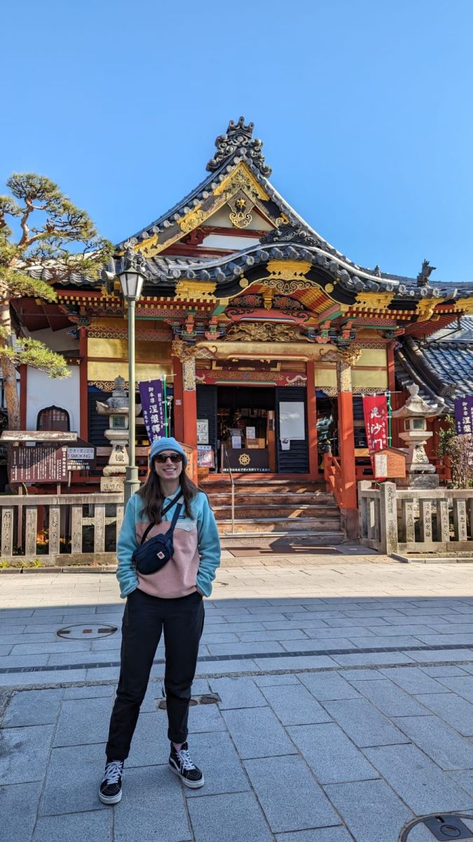 Jess standing in front of a Japanese shrine