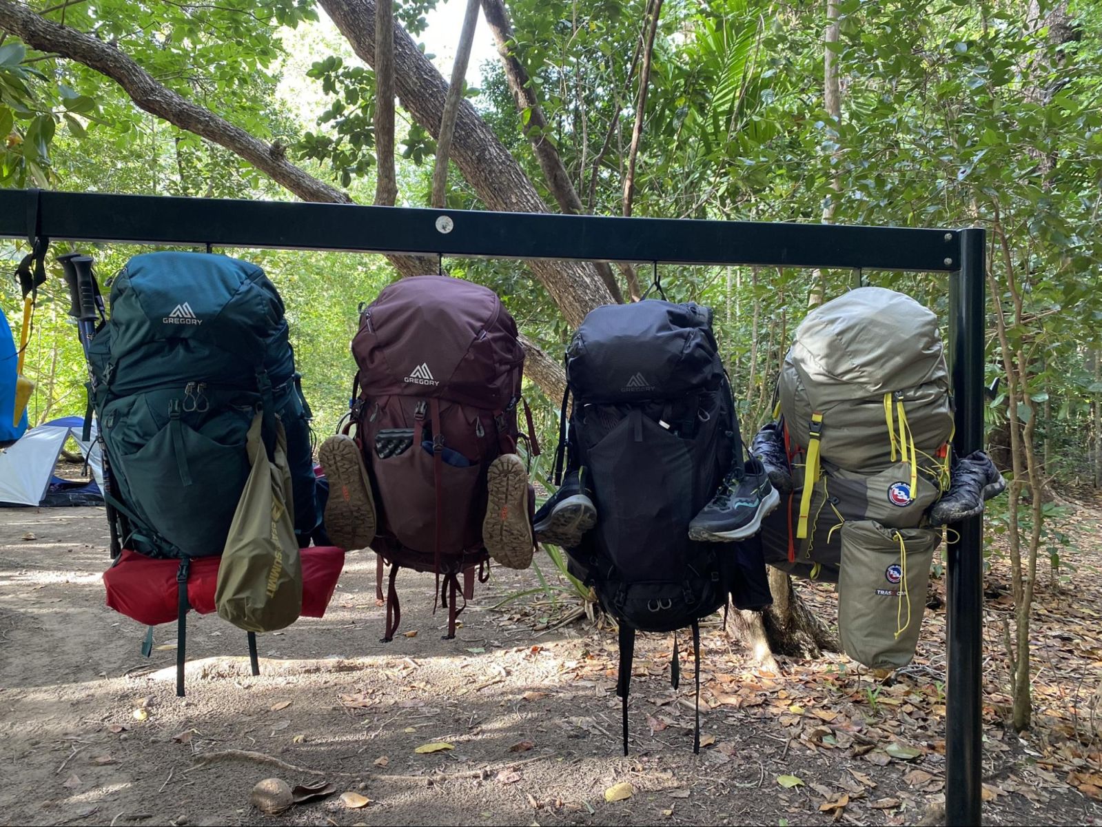 Hiking packs being hung up on the trail